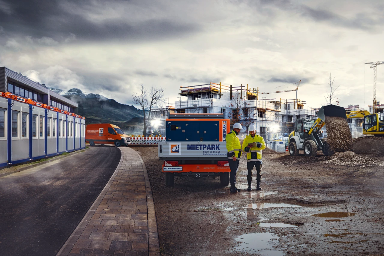 CGI Rendering einer Baustelle, 2 HKL Fahrzeuge und zwei Mitarbeiter sind zu sehen
