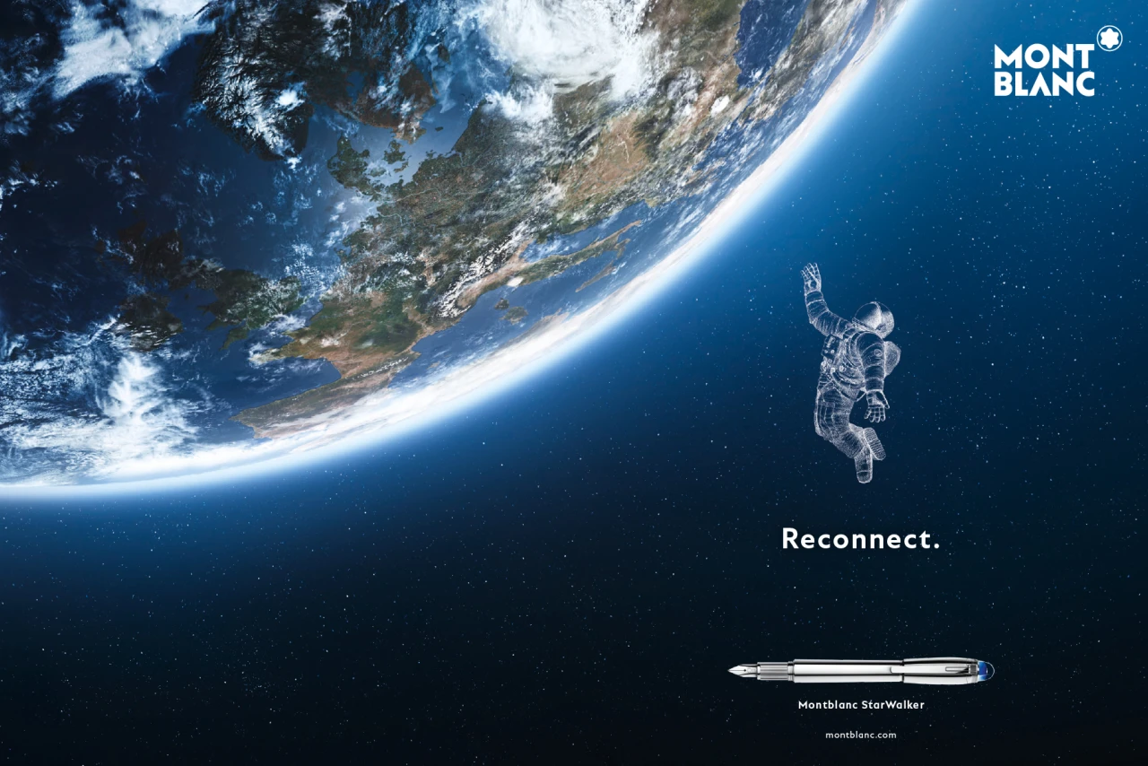 Mit Reconnect präsentierte Montblanc sein Universum - bestehend aus Abenteuer, Tradition, Leidenschaft und Qualität. CGI Rendering einer Montblanc Anzeige. Ein Weltraum und ein illustrierter Astronaut ist zu sehen. Unten ist ein Montblanc Schreibgerät zu sehen.